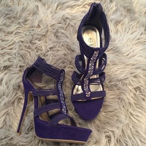 SOLD Purple pumps - never worn
